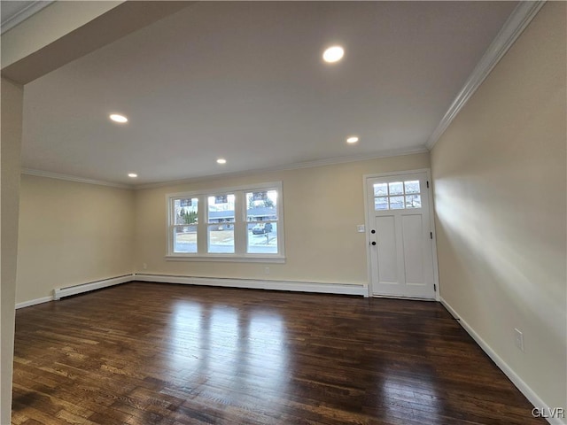 foyer featuring a baseboard heating unit, ornamental molding, and dark hardwood / wood-style floors