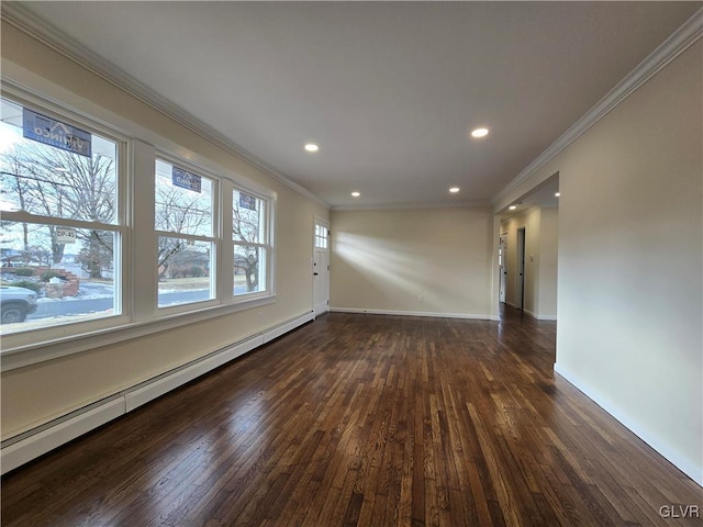 unfurnished room featuring ornamental molding, a baseboard heating unit, and dark hardwood / wood-style flooring