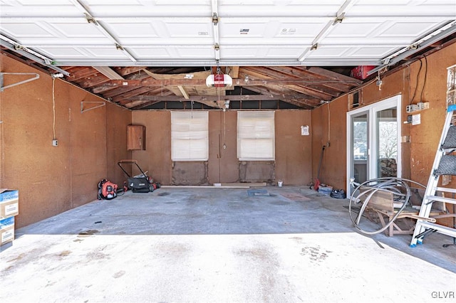 garage featuring a garage door opener