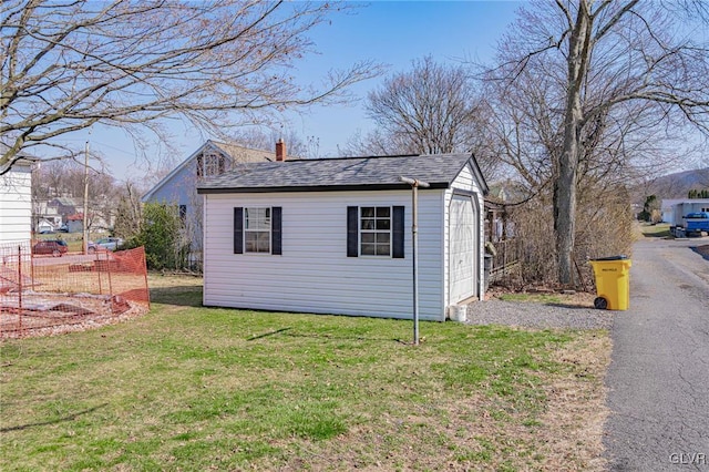 view of outdoor structure with a yard