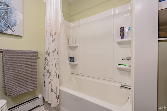 bathroom with a baseboard radiator and shower / bathtub combination with curtain