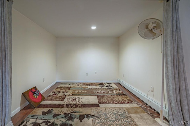 unfurnished room with hardwood / wood-style floors