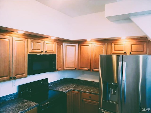 kitchen with black appliances and dark stone counters