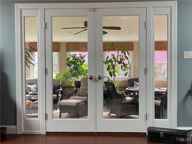 doorway to outside featuring ceiling fan and french doors