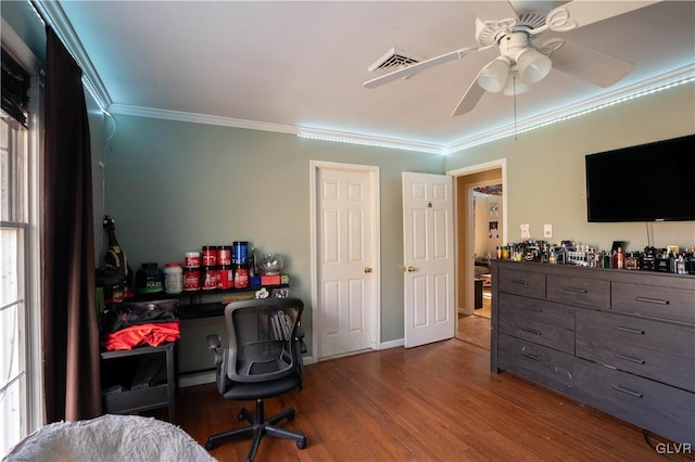 office featuring crown molding, wood-type flooring, and ceiling fan