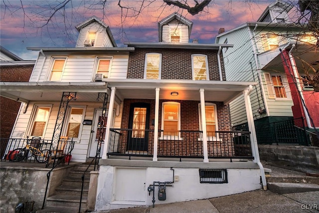 view of front facade with covered porch