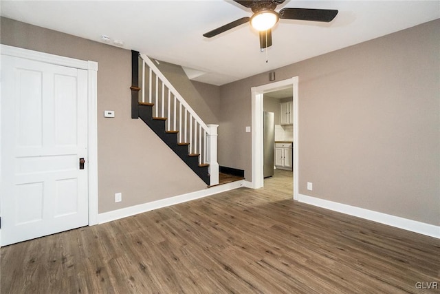 unfurnished room featuring hardwood / wood-style flooring and ceiling fan