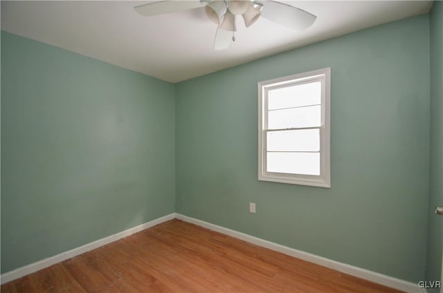 spare room with ceiling fan and light hardwood / wood-style flooring