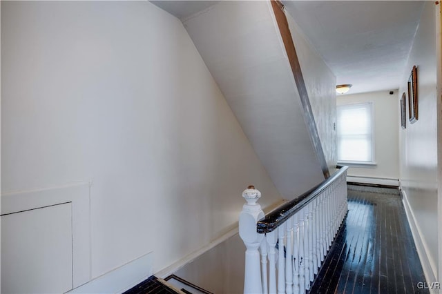 349 Carlton Rd, Paradise Twp, PA 18344 - stairway with a baseboard radiator and hardwood / wood-style floors