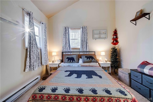 carpeted bedroom with lofted ceiling and a baseboard heating unit