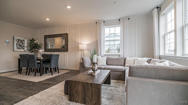 living room featuring dark hardwood / wood-style flooring