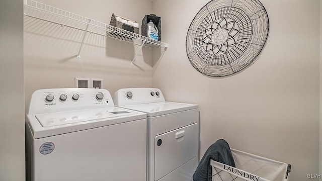 laundry area featuring separate washer and dryer