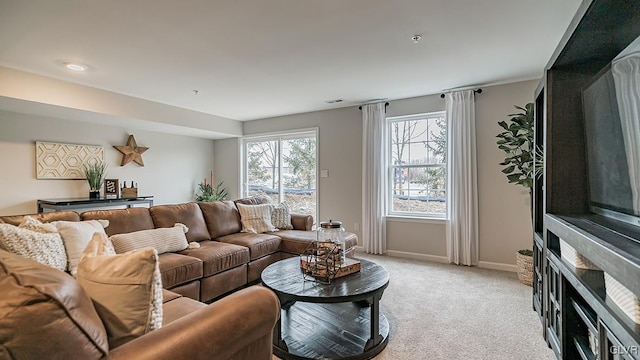 living room with light colored carpet