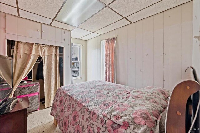 bedroom with a drop ceiling