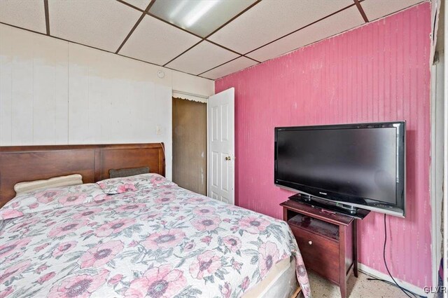 bedroom featuring a paneled ceiling