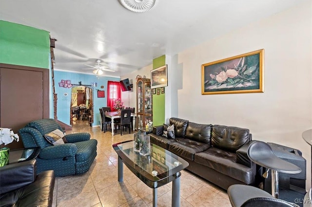 tiled living room featuring ceiling fan