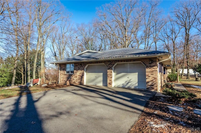 view of side of property featuring a garage