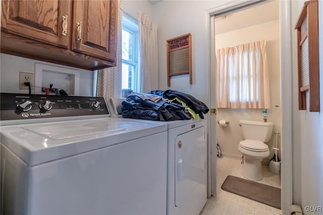 laundry area featuring separate washer and dryer