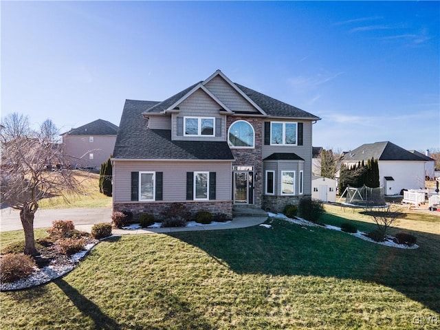 view of front of house with a front lawn