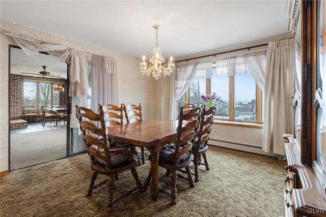 carpeted dining room featuring ceiling fan with notable chandelier