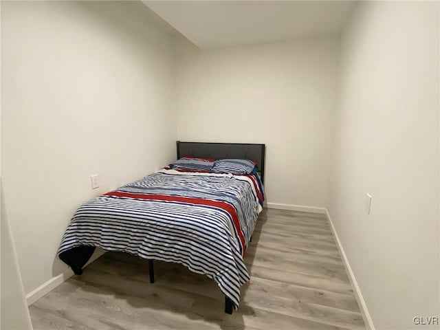 bedroom featuring light hardwood / wood-style floors