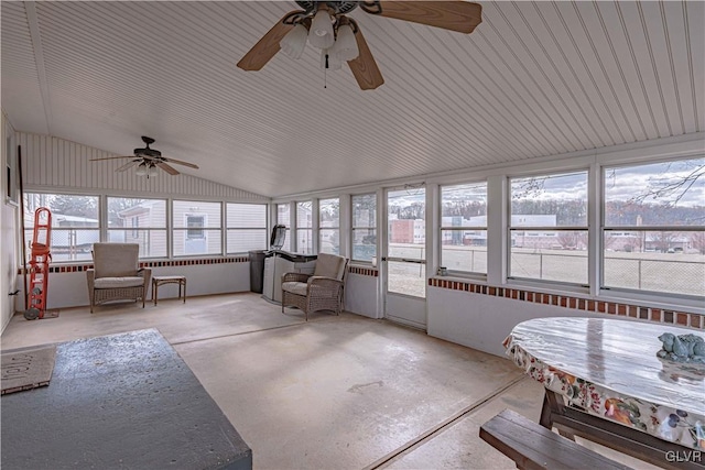 unfurnished sunroom with lofted ceiling