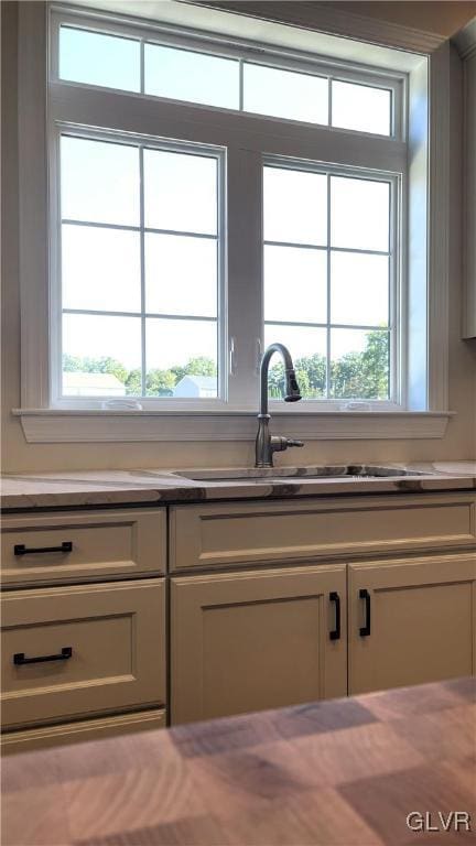 kitchen with sink and a healthy amount of sunlight