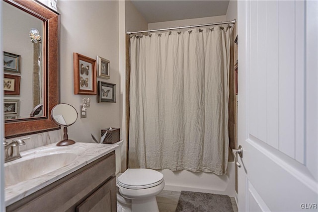 full bathroom featuring toilet, shower / bath combo with shower curtain, tile patterned floors, and vanity