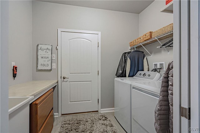 laundry area with washer and dryer