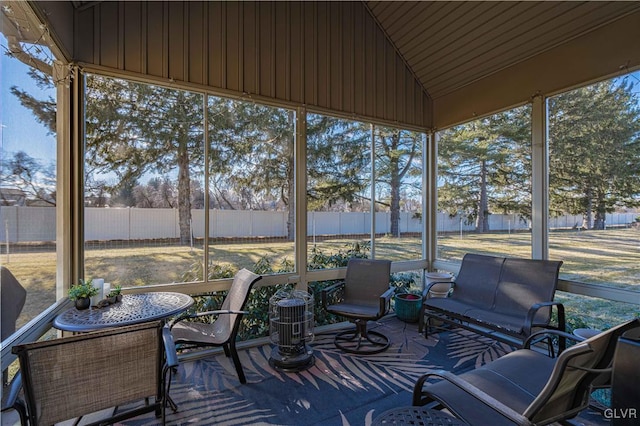 sunroom / solarium with vaulted ceiling