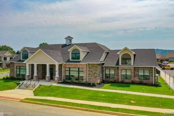 view of front of house with a front lawn