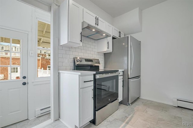 kitchen with stainless steel appliances, light countertops, a baseboard heating unit, white cabinets, and under cabinet range hood