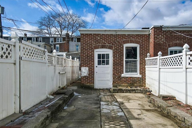 view of outbuilding featuring a fenced backyard