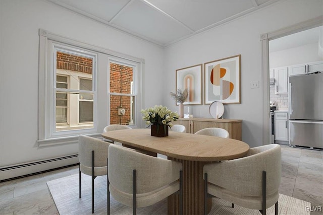 dining area featuring a baseboard radiator