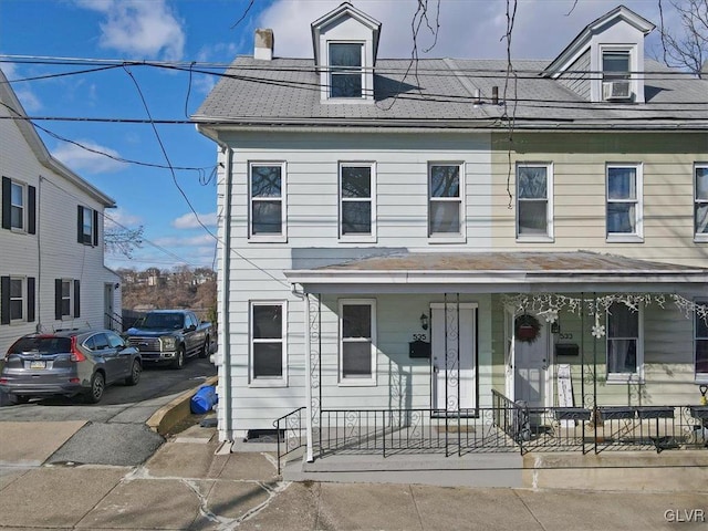 view of front of home featuring covered porch