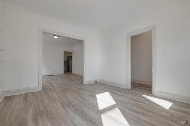 empty room featuring light hardwood / wood-style floors