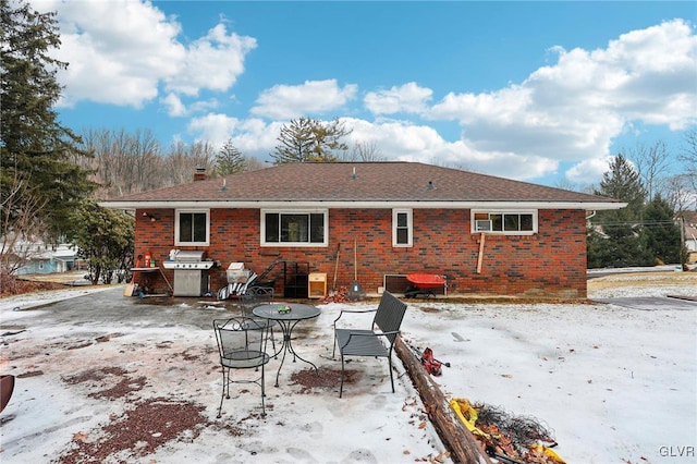 view of snow covered house