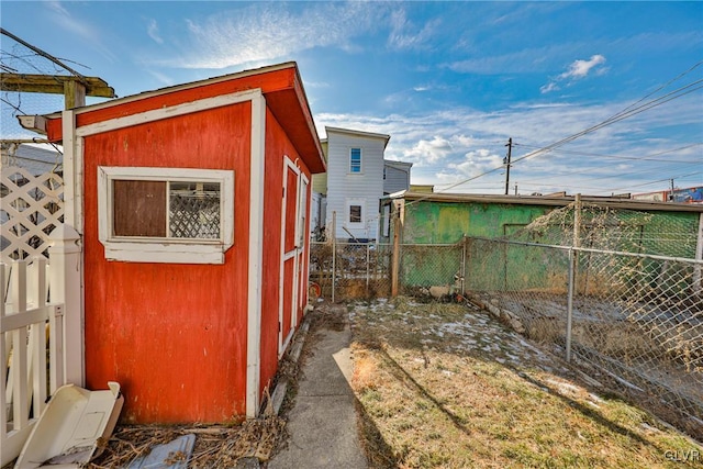 view of home's exterior featuring a storage shed