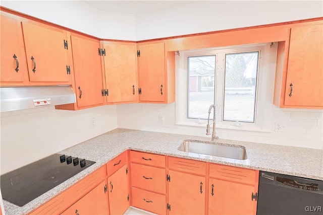 kitchen featuring sink, black appliances, extractor fan, and decorative backsplash