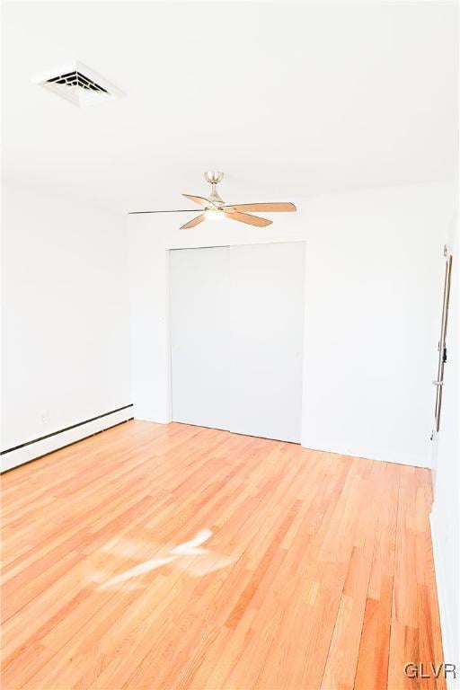 interior space featuring ceiling fan