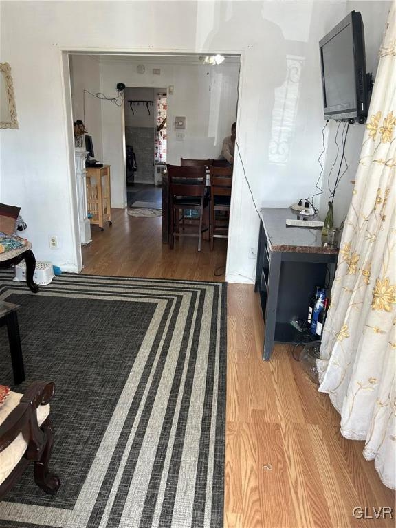 living area with wood finished floors