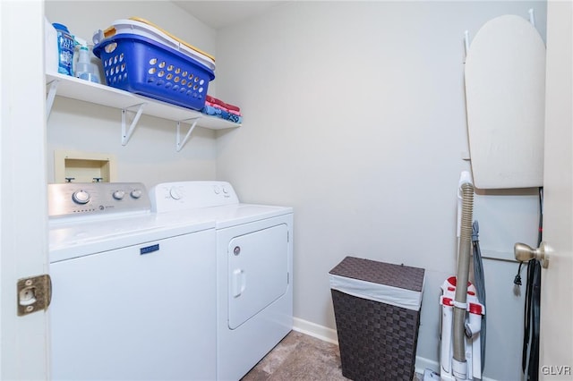 laundry room with washer and dryer