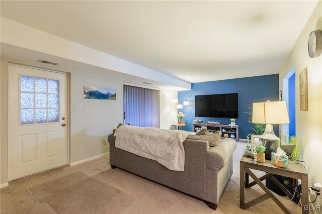 living room featuring light colored carpet