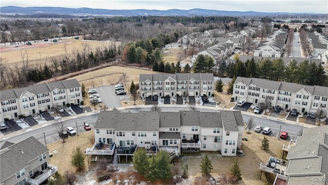 bird's eye view featuring a residential view and a mountain view