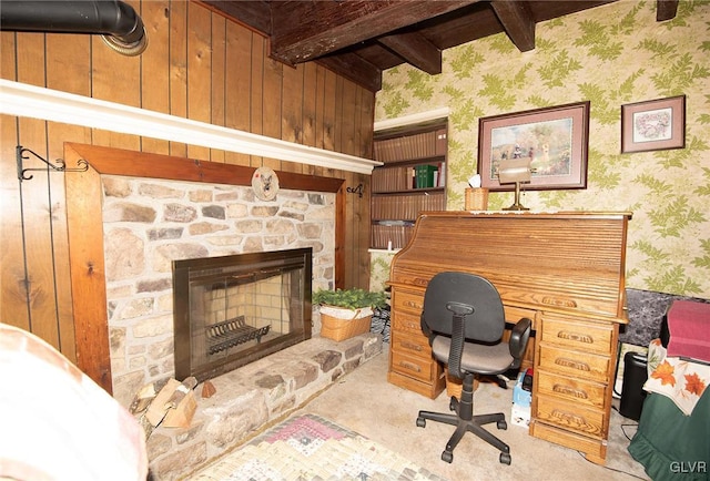 office with light carpet, wallpapered walls, a fireplace, and vaulted ceiling with beams