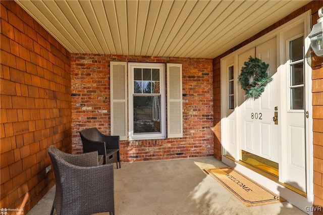 entrance to property with covered porch