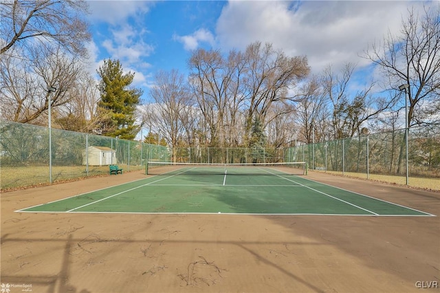 view of sport court featuring community basketball court and fence