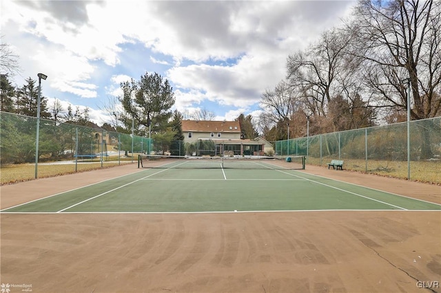 view of sport court featuring community basketball court and fence