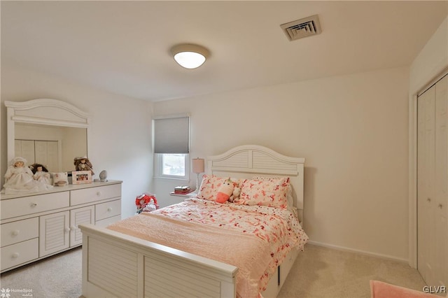 bedroom with light carpet, baseboards, and visible vents