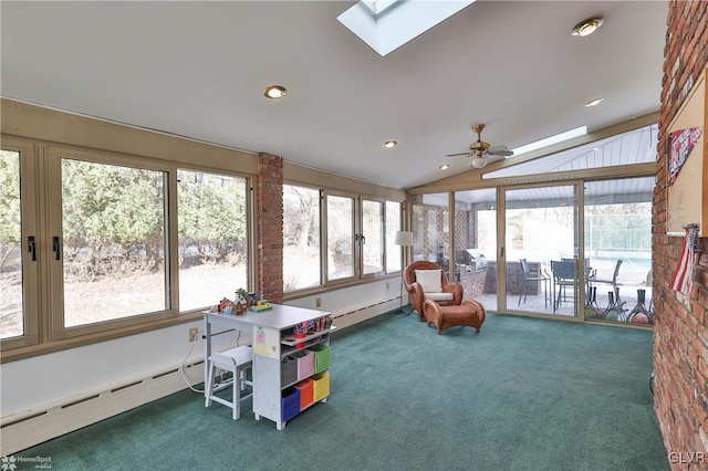 sunroom / solarium featuring a baseboard heating unit, vaulted ceiling with skylight, and a ceiling fan